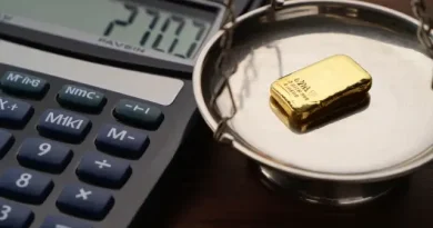 pesée du poids d'un lingot d'or